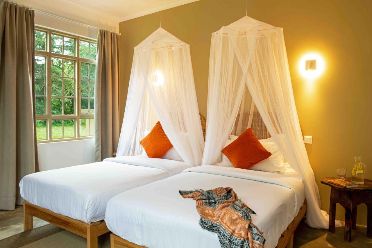 The Safari House Hotel Usa River Bagian luar foto