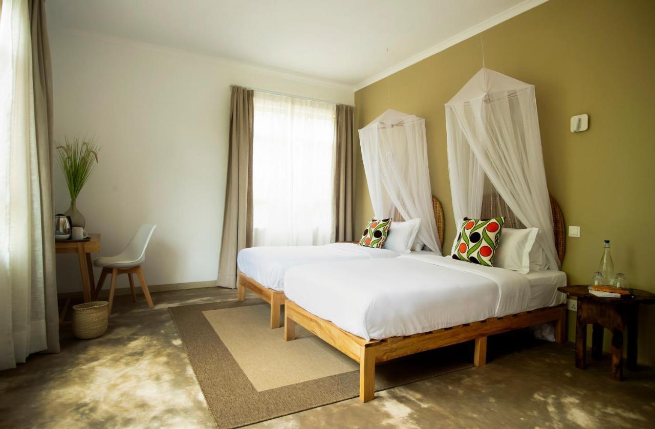 The Safari House Hotel Usa River Bagian luar foto